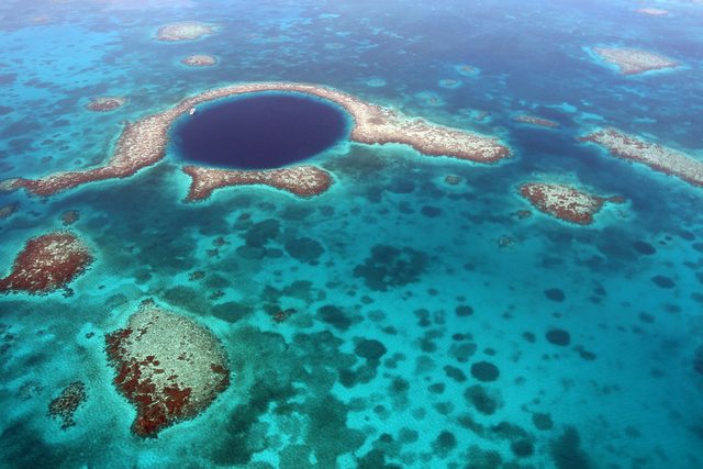 Aerial view of the Great Blue Hole on the Belize Barrier Reef